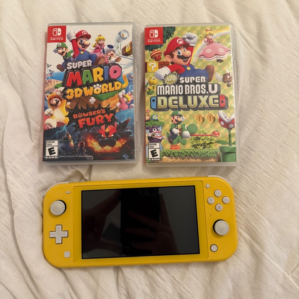 Nintendo Switch Lite in Yellow with Mario Games